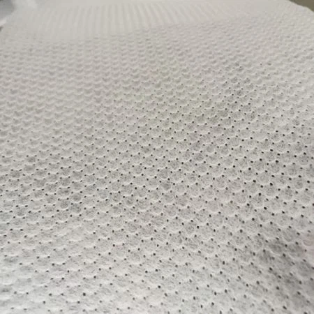 बेबी डायपर टॉप शीट के लिए छिद्रित और उभरा हुआ गैर बुना हुआ कपड़ा
